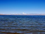 21 Lake Manasarovar And Mount Kailash From Trugo Gompa Lake Manasarovar stretches from Trugo Gompa on the south shore to Mount Kailash in the distance past the north shore.